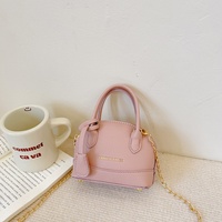 Sac à main mini tendance pour enfants en cuir PU, petit sac bandoulière avec sangle réglable, sac à bandoulière mignon pour femmes avec décoration étoile