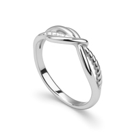 Bague unisexe tendance en acier inoxydable plaqué or 18 carats avec pierres précieuses, torsadée et entrelacée à double enroulement