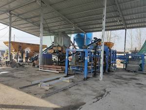 Machine de fabrication de blocs creux en béton vibré Machine à briques à verrouillage automatique en Jamaïque, Malawi - Product Image 5