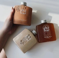 Bouteille de sauce BBQ à bas prix de fabrication chinoise, 200 ml, bouteille en verre plate avec couvercle en plastique inviolable pour sauce piquante