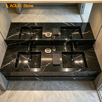 Meuble-lavabo mural double vasque de luxe, moderne et avant-gardiste, en marbre Nero Marquina, pour salles de bain d'hôtels cinq étoiles et chambres exécutives