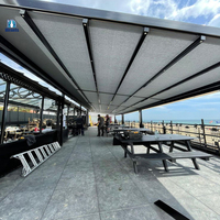 Auvent de toit escamotable d'ouverture de terrasse moderne de fournisseur d'usine pour le café et le restaurant extérieurs
