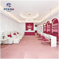 Ensemble de mobilier élégant rose et blanc pour salon de manucure, chaise et table de manucure, design intérieur personnalisé pour studio de manucure et boutique de nail art, fourni directement par l'usine.