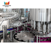 Machine de remplissage électrique automatique de vente chaude pour les boissons CSD 220V 3808V 415V Machine de remplissage de boisson carbonatée de bouteille en plastique