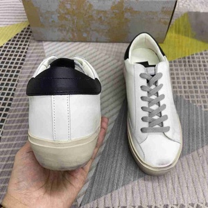 2026 Original Men Silver Genuine Leather Outsole Fashion Trend Breathable Lace-up Round Toe Sports Walking White Goose Sneakers - Product Image 2