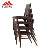 Chaise de salle à manger empilable en métal imitation bois avec assise et dossier rembourrés pour hôtels, restaurants, salles de banquet et lieux d'événements
