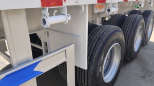 รถพ่วงพื้นเรียบ 3 เพลา 40 ฟุต 50 ตัน 20 ฟุต 60 ฟุต 50 ฟุต สำหรับบรรทุกตู้คอนเทนเนอร์ รถพ่วงกึ่งพ่วงสำหรับบรรทุกยานพาหนะ คุณภาพดีที่สุด - Product Image 5