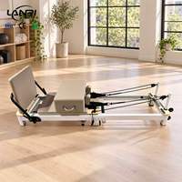 Reformer de Pilates commercial pliable en aluminium blanc personnalisé, lit portable réglable pour studio professionnel de fitness