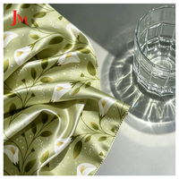 Tissu en satin de polyester de luxe tissé à motif floral imprimé sur mesure, vente en gros pour robes féminines