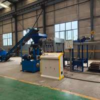 Machine automatique hydraulique QT4-15B pour la fabrication de briques creuses en béton, de pavés et de briques de sol emboîtables