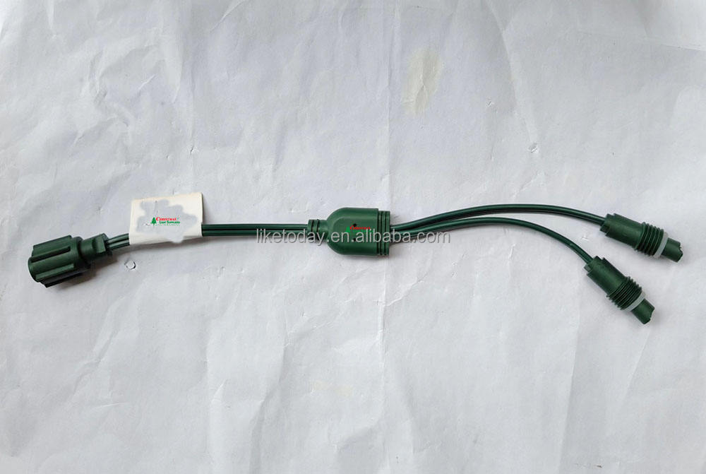 Adaptador coaxial verde de 3 vías