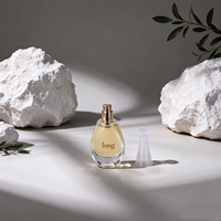 Flacon de parfum élégant en verre en forme de goutte d'eau avec bouchon en verre sphérique, col côtelé doré, livré avec du parfum liquide