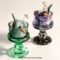 Diffuseur d'arômes en verre borosilicate vert LARISSA en gros avec copeaux de cristal naturel et décorations de fleurs séchées de cannelle
