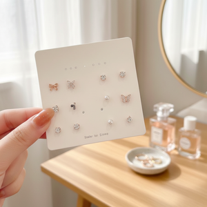 Orecchini di tendenza in oro rosa in acciaio inossidabile vendita a caldo con arco di perle a farfalla Design stile religioso per ragazze - Product Image 3