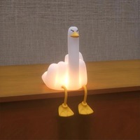 Haute qualité mignon allumer canard canard lampe Silicone LED pépinière veilleuse support pour téléphone portable LED Squishy canard veilleuse