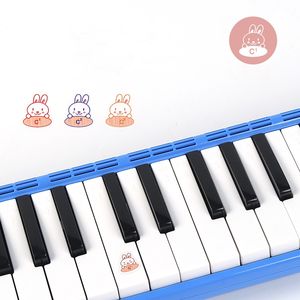 Teclado Musical chino instrumento colorido 32 teclas melódica con bolsa de transporte - Product Image 6