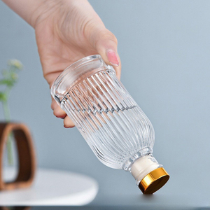 Bouteilles de <span class=keywords><strong>vin</strong></span> rondes de luxe vides 40ml 100ml 200ml en verre avec bouchons en caoutchouc - Product Image 4