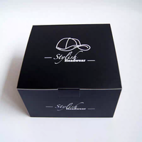 Boîte d'emballage pliable en carton noir de haute qualité pour casquette de baseball, avec logo personnalisé et finition mate en carton.