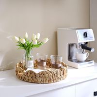 Duurzame handgemaakte ronde opbergbak van zeegras met handvat voor boho bloemen, fruit, brood en rieten bureau-organisatie
