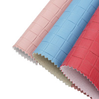 Tissu en cuir synthétique vegan en microfibre PU tissé extensible de 1 mm avec logo personnalisé en relief pour canapé, vêtements et décoration intérieure