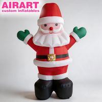 Père Noël gonflable sur pied aux bras levés, ventre proéminent, personnalisé et amusant pour les fêtes de Noël