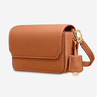 Sac à bandoulière portable pour femme en cuir véritable durable avec protection RFID, fermeture à rabat et sangle amovible