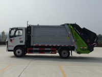 Camion compacteur de déchets mini Dongfeng Tuyi avec moteur diesel Euro 3, collecte et compression intégrées, chargeur arrière, transmission 4x2, manuel