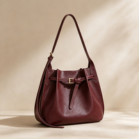 Sac épaule femme premium OEM ODM cuir grainé authentique design segmenté jaune pâle boucle sangle fine