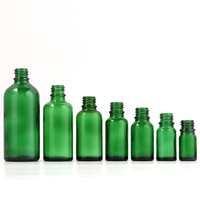 Flacon compte-gouttes cosmétique 15ml 20ml 30ml 50ml 100ml en verre vert avec bouchon à vis, logo personnalisable, vente en gros pour huiles essentielles et parfums