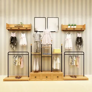Kids Clothing Display Rack Boutique Wood Metal Children Clothes Store Interior Design Baby Garment Cloth Shop Shelves Stand