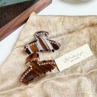 Pince à cheveux en acétate taille moyenne à motif rayé Liwu, incrustée de diamants, pour femme