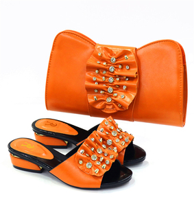 <span class=keywords><strong>Scarpe</strong></span> <span class=keywords><strong>arancioni</strong></span> e borsa con <span class=keywords><strong>tacco</strong></span> <span class=keywords><strong>basso</strong></span> e pochette per abbinarsi a <span class=keywords><strong>scarpe</strong></span> Casual e Set di borse - Product Image 1