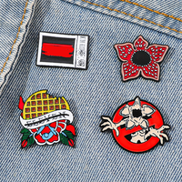 Broche en alliage Fashion Eleven Waffle Demogorgon Flower TV Logo, épingles de revers à thème personnage d'horreur et de science-fiction pour collection de fans / cadeau