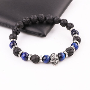 Di Yiwu Fabbrica di Gioielli Affittare Che Fanno Pietra Lavica Naturale Blu Occhio di <span class=keywords><strong>Tigre</strong></span> In Rilievo In Acciaio Inox Fascino Del Cranio Braccialetto Elastico Degli Uomini - Product Image 2