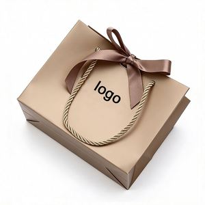 Factory Direct Customizable Metallic Brown Paper Shopping <b>Bag</b> With Bow & Rope Handles Elegant Ideal for Boutique <b>Gift</b> Packaging - Product Image 1