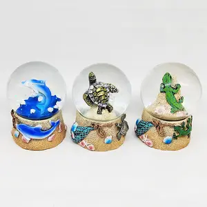 创意旅游礼品定制树脂工艺品海洋风格热带鱼水晶球雪花阿鲁巴纪念品海豚雪球
