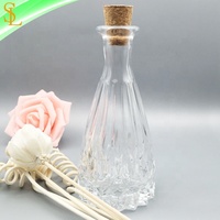 Verre transparent personnalisé de 140ml pour bouteilles de diffuseur de roseaux Design fantaisie en relief avec bâtons de rotin décoratifs Bouchon en caoutchouc Wholes