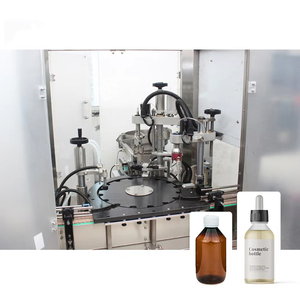 Machine de remplissage et de bouchage entièrement automatique pour flacons ronds en plastique et en verre de 10 ml et 30 ml, pour huiles essentielles et eau, petit volume - Product Image 1
