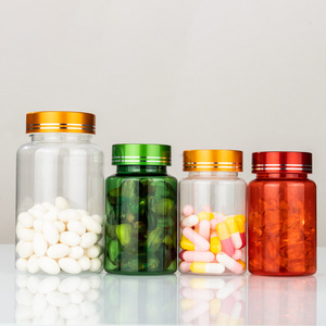 <b>Small</b> <b>bottles</b> of health supplements with caps, repackaged and sealed, including calcium tablets and capsules, in transparent - Product Image 2