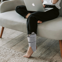 Attelle de cheville à compression avec coussin d'air et pompe à air intégrée