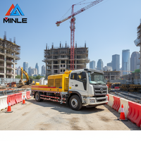 Pompe à béton montée sur camion de la marque Minle, largement utilisée pour le revêtement des tunnels autoroutiers et les travaux de génie hydraulique à grande échelle