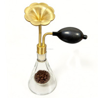 Flacon de parfum testeur en verre doré pour huiles essentielles, café et arômes, avec pompe en aluminium