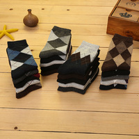 Vente en gros 5 paires de chaussettes épaisses et chaudes en laine de lapin pour hommes, chaussettes d'hiver de robe d'affaires de couleur unie à tube moyen