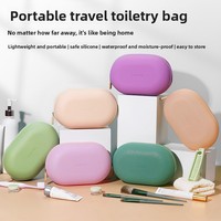 Sac de toilette en silicone personnalisé, sac cosmétique imperméable, sac de rangement de voyage portable grande capacité, simplicité urbaine mignonne, Chine