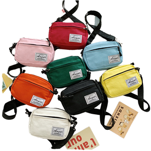 Sac bandoulière unisexe en toile avec fermeture éclair, motif lettres et bonbons, couleur unie, léger, tendance, pour voyage - Product Image 1