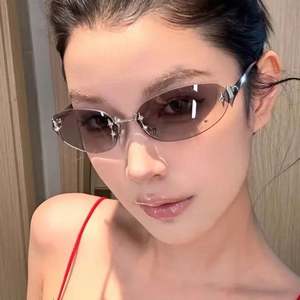 Lunettes de soleil rétro sans monture 2025, style Y2K, avec branches étoilées, protection UV400, en métal, pour hommes et femmes - Product Image 1