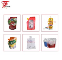 Machine automatique de remplissage, de scellage et de bouchage de sachets debout pour shampooing, lessive, crème, jus, liquide