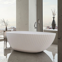 Baignoire autoportante en pierre artificielle de luxe, design cannelé, forme ovale, profonde, confortable, pour une immersion relaxante