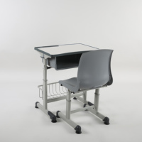 Ensemble de table et chaise en métal à hauteur réglable avec plateau en bois pour les enfants du primaire, mobilier scolaire durable et commercial