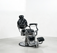 Fauteuils de barbier vintage haut de gamme en cuir noir capitonné, fauteuil de barbier professionnel inclinable hydraulique en chrome poli